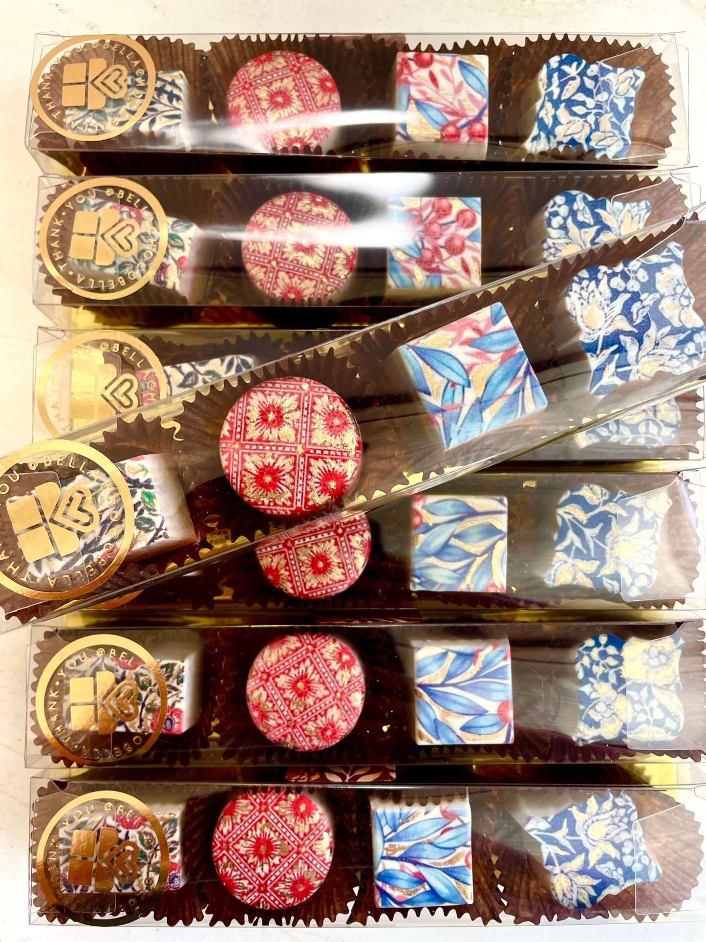 4-piece box open with chocolates, Team tier corporate gift box
